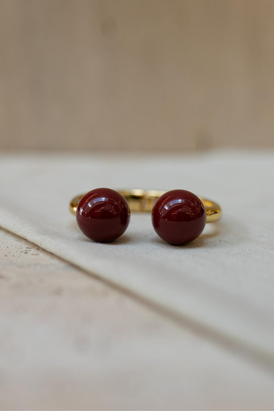 Bracelete Dourado com Bolas de Resina Vinho