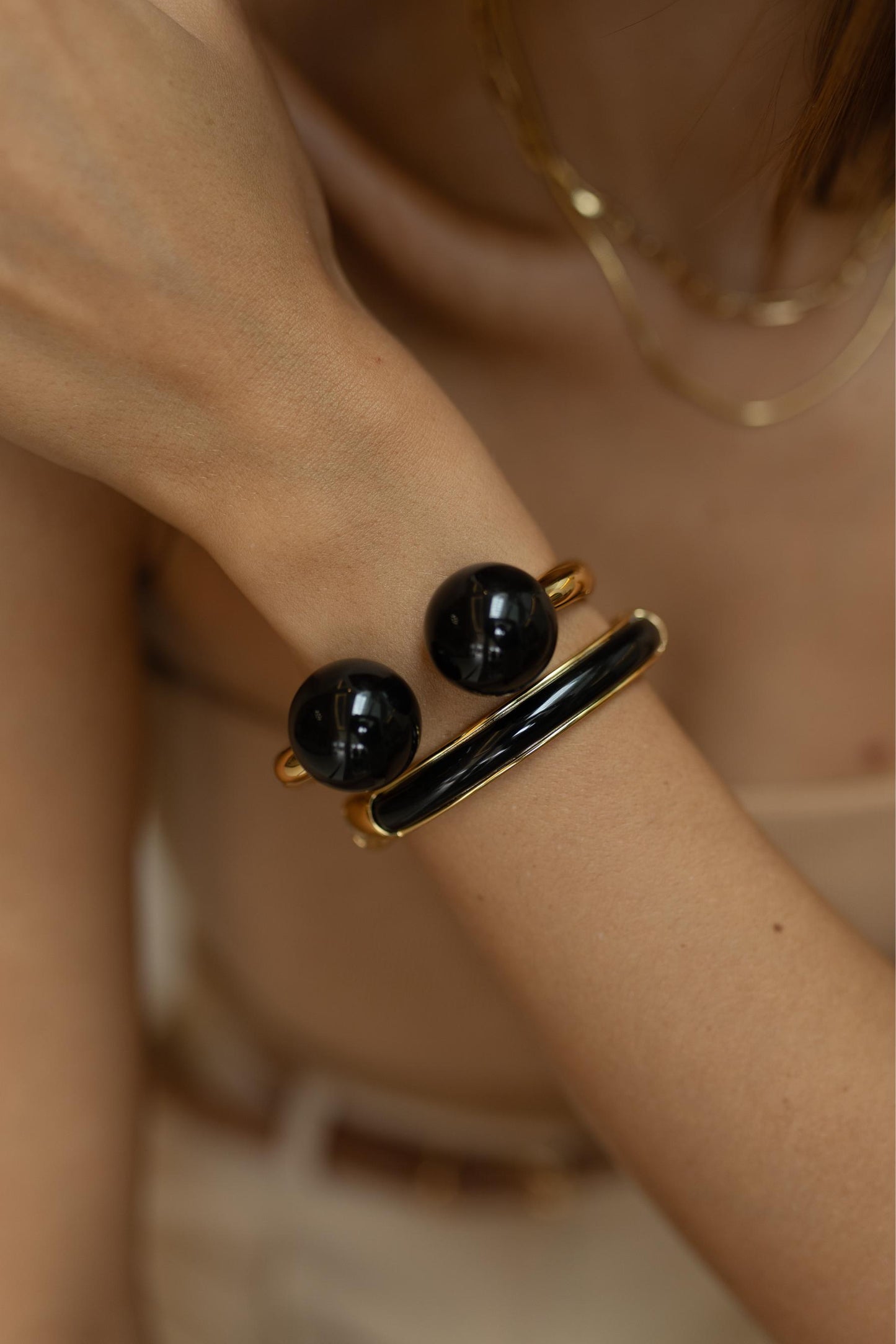 Bracelete Preto Dourado