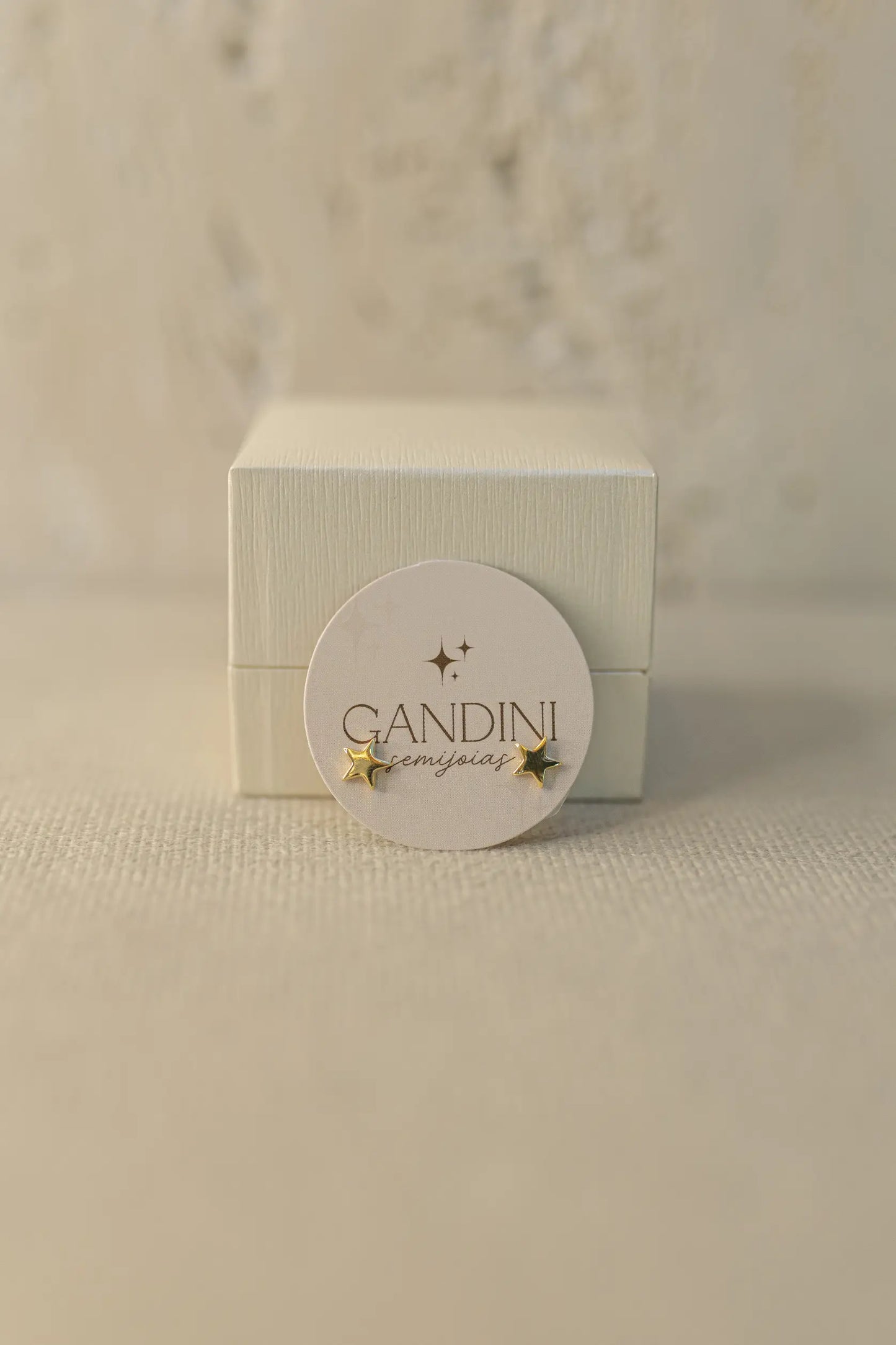 Brinco Estrela Pequena Dourada