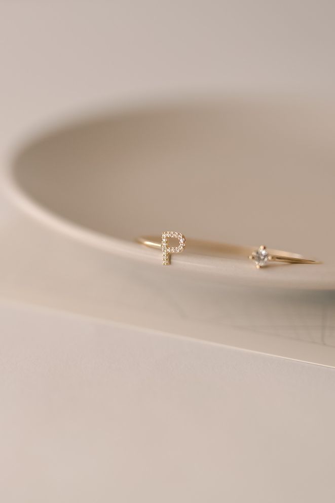 Bracelete Ponto de Luz e Letra Cravejada Dourado