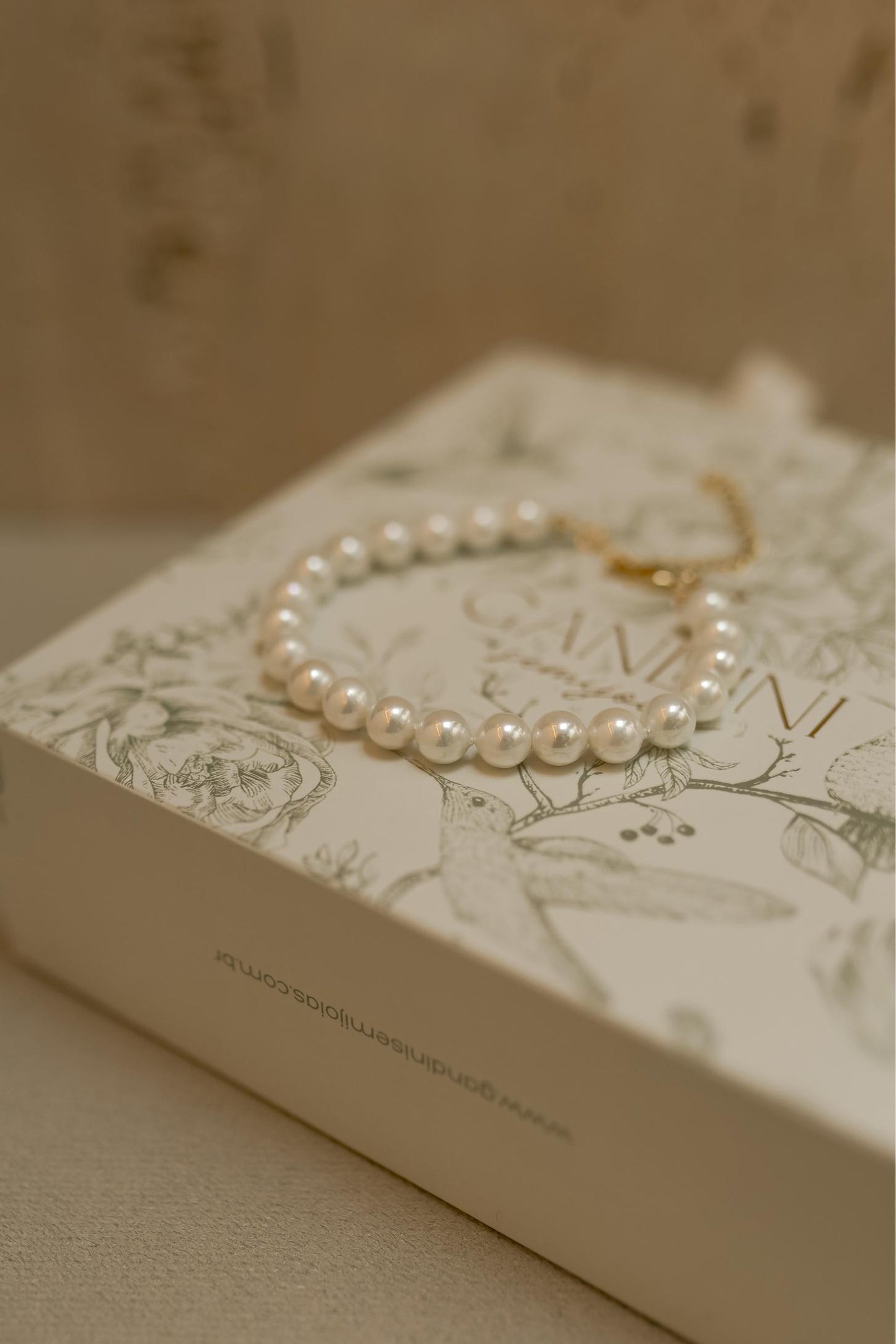 Pulseira de Pérola Shell Dourado