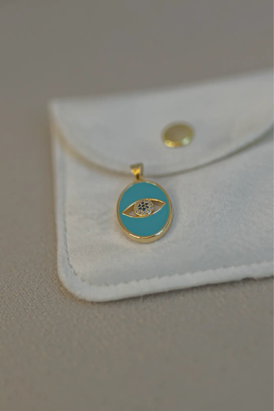 Pingente Oval Esmaltado Turquesa Olho Grego Dourado