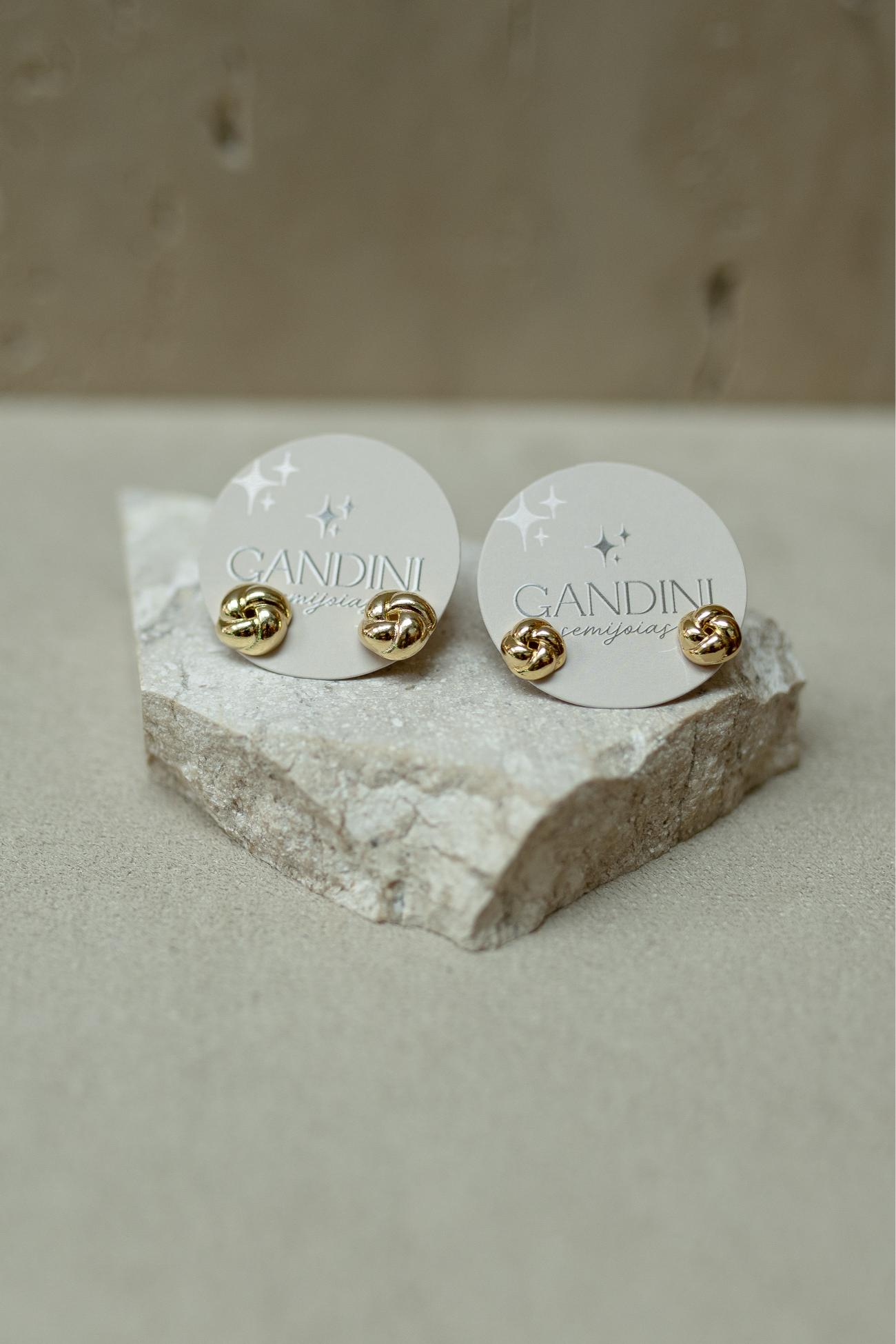 Brinco Botão Torcido M Dourado