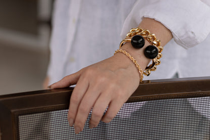 Bracelete Dourado com Bolas de Resina Preto Dourado