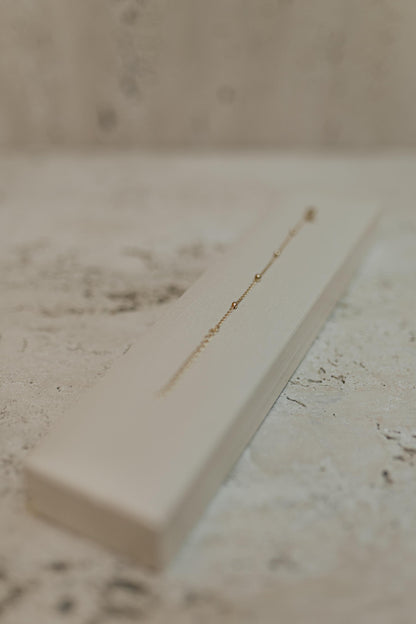 Pulseira Infantil de Bolinhas Dourado