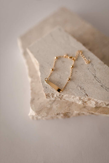 Pulseira Infantil Placa de Bolinhas Dourado