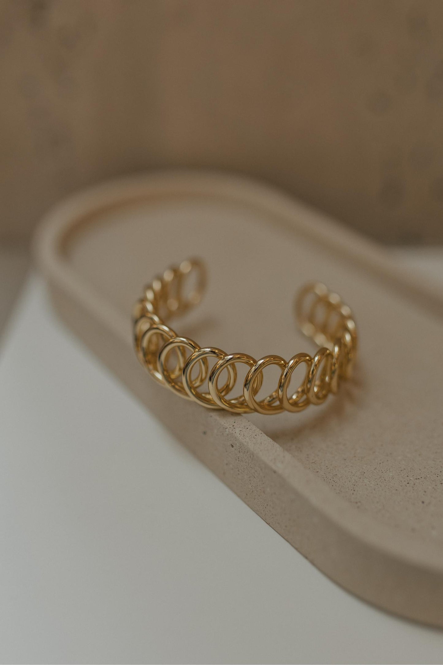 Bracelete Entrelaçado Dourado