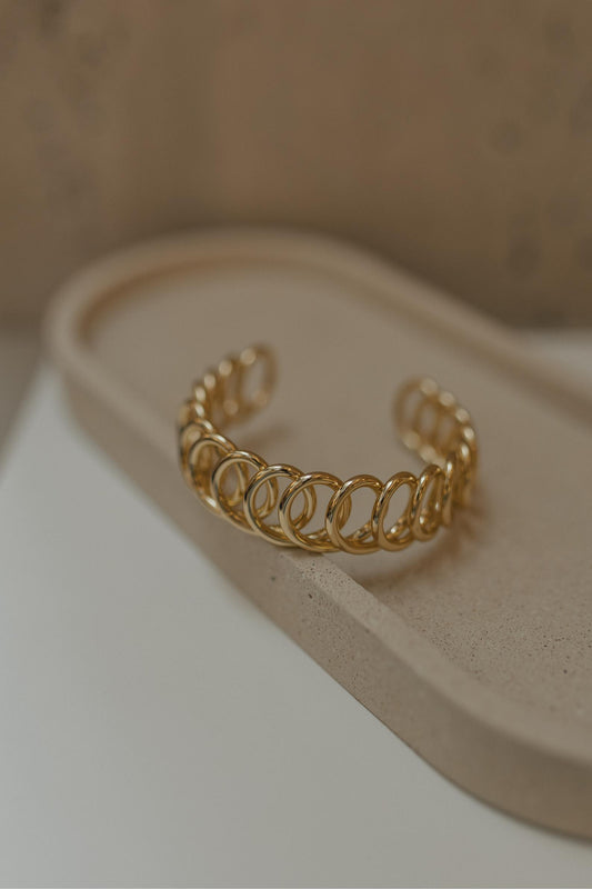 Bracelete Molas Entrelaçadas Dourado