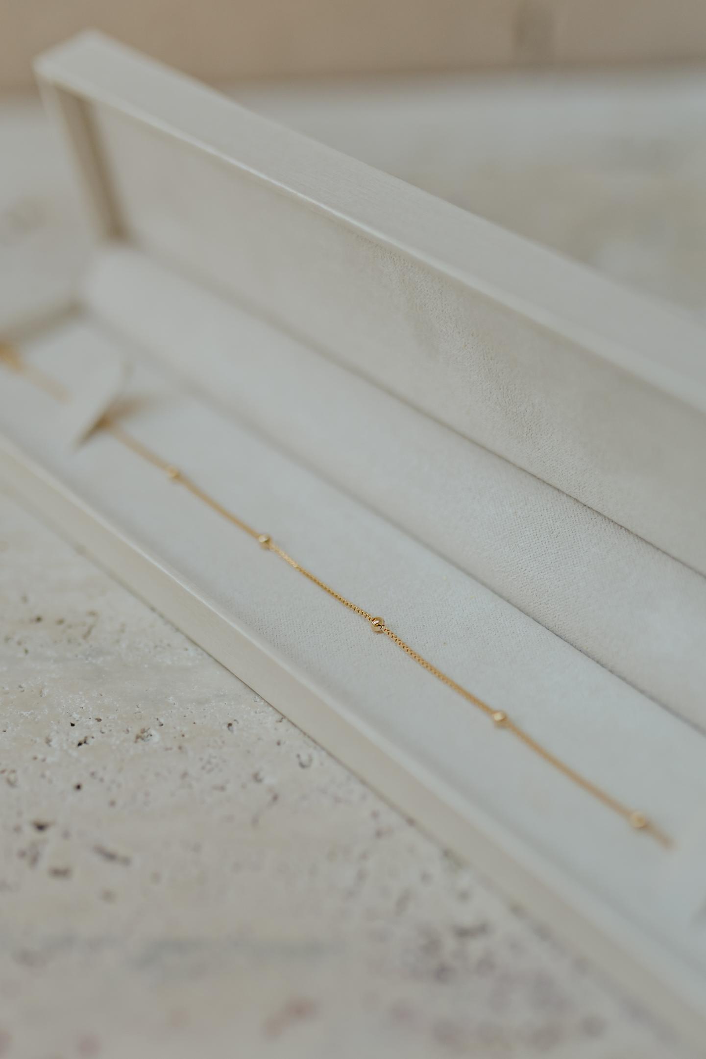 Pulseira Minimalista 5 Bolinhas Dourado