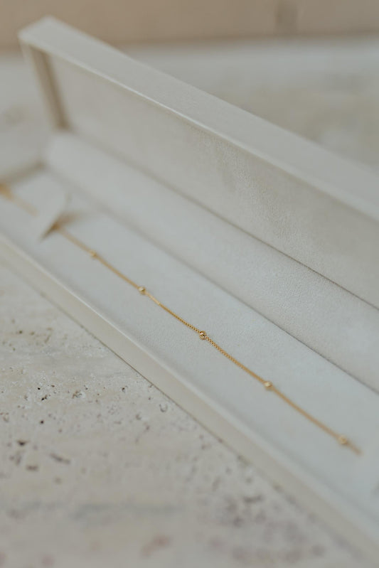 Pulseira Minimalista 5 Bolinhas Dourado