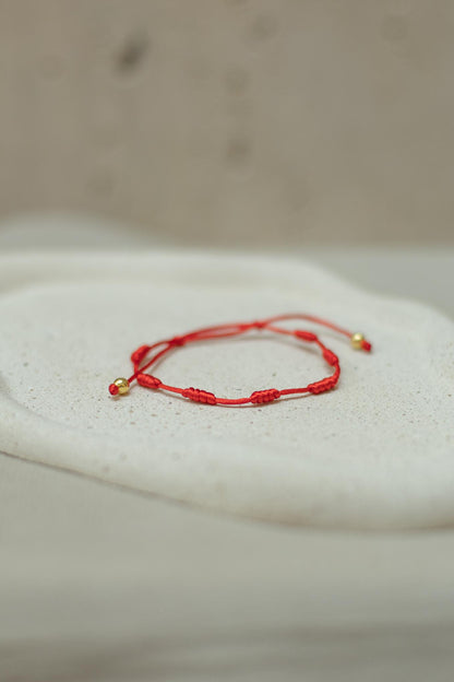 Pulseira 7 Nós Vermelha Dourado