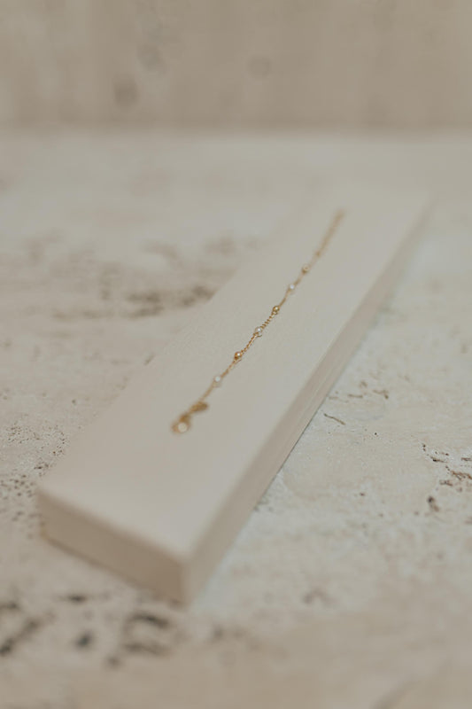 Pulseira Infantil Pérola e Bolinha Dourado