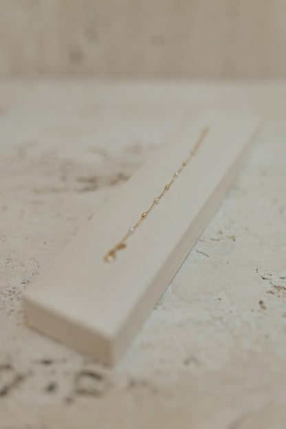 Pulseira Infantil Pérola e Bolinha Dourado