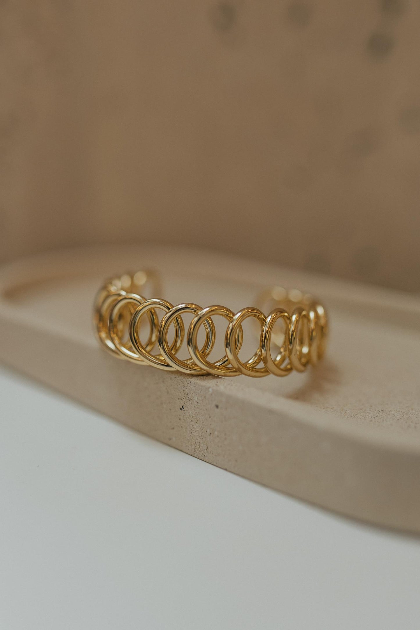 Bracelete Entrelaçado Dourado