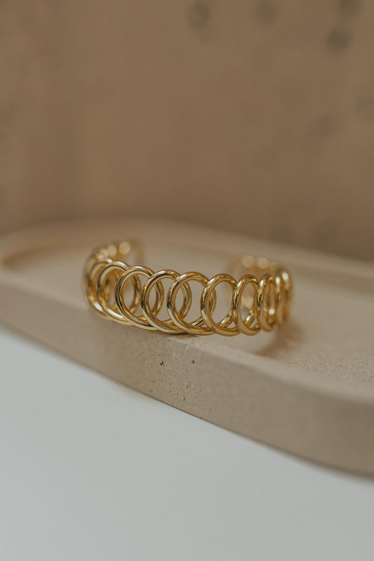 Bracelete Molas Entrelaçadas Dourado