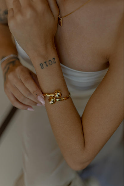 Bracelete de Bolas Liso Dourado