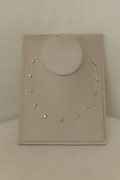 Colar Fio de Nylon Pontos de Luz Dourado