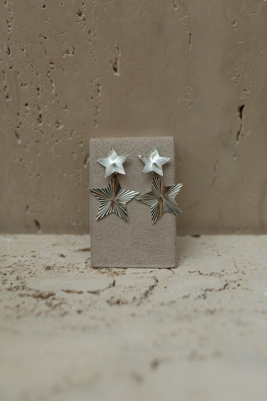 Brinco 2 em 1 Pêndulo Estrelas Ródio Branco