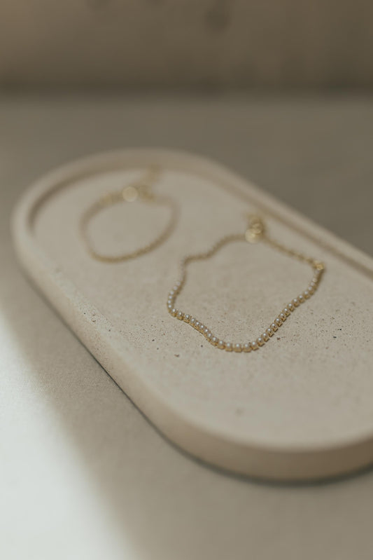 Pulseira Pérolas 2mm Dourado