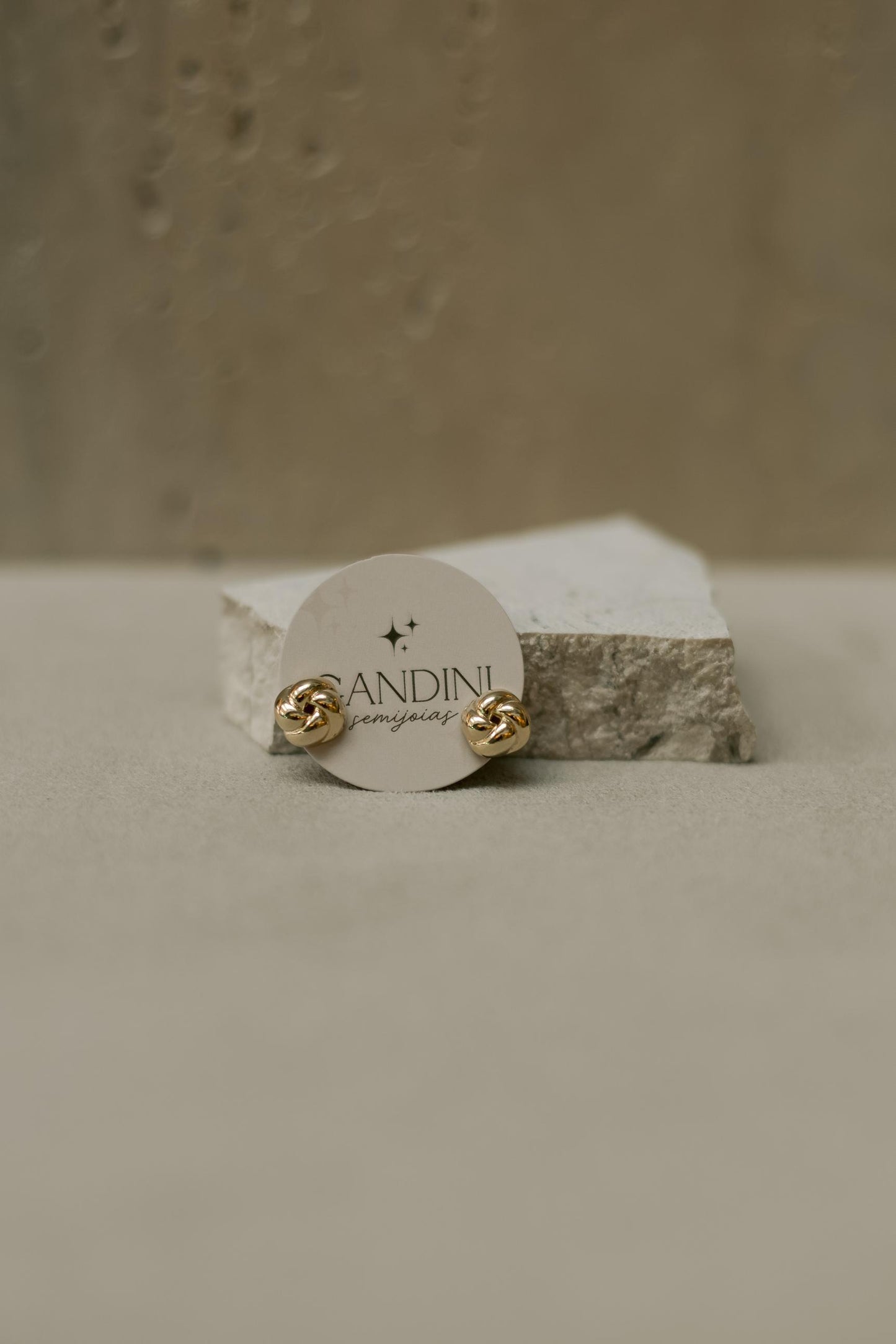 Brinco Botão Torcido G Dourado