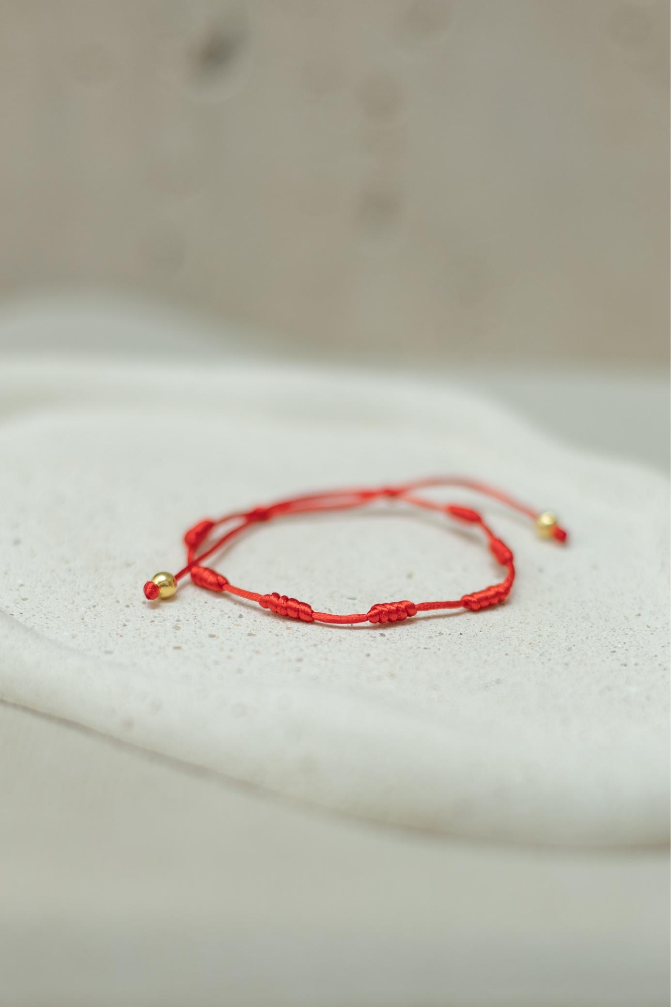 Pulseira 7 Nós Vermelha Dourado