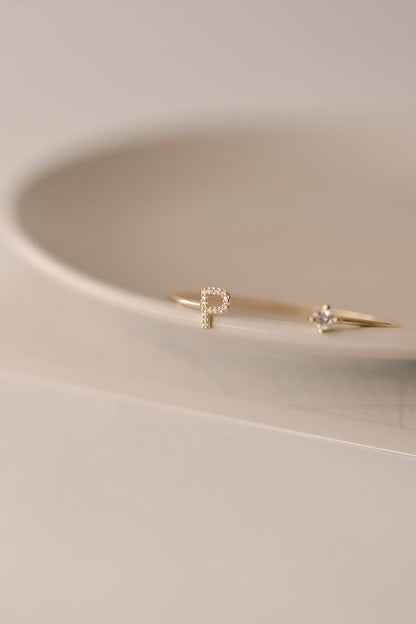 Bracelete Ponto de Luz e Letra Cravejada Dourado