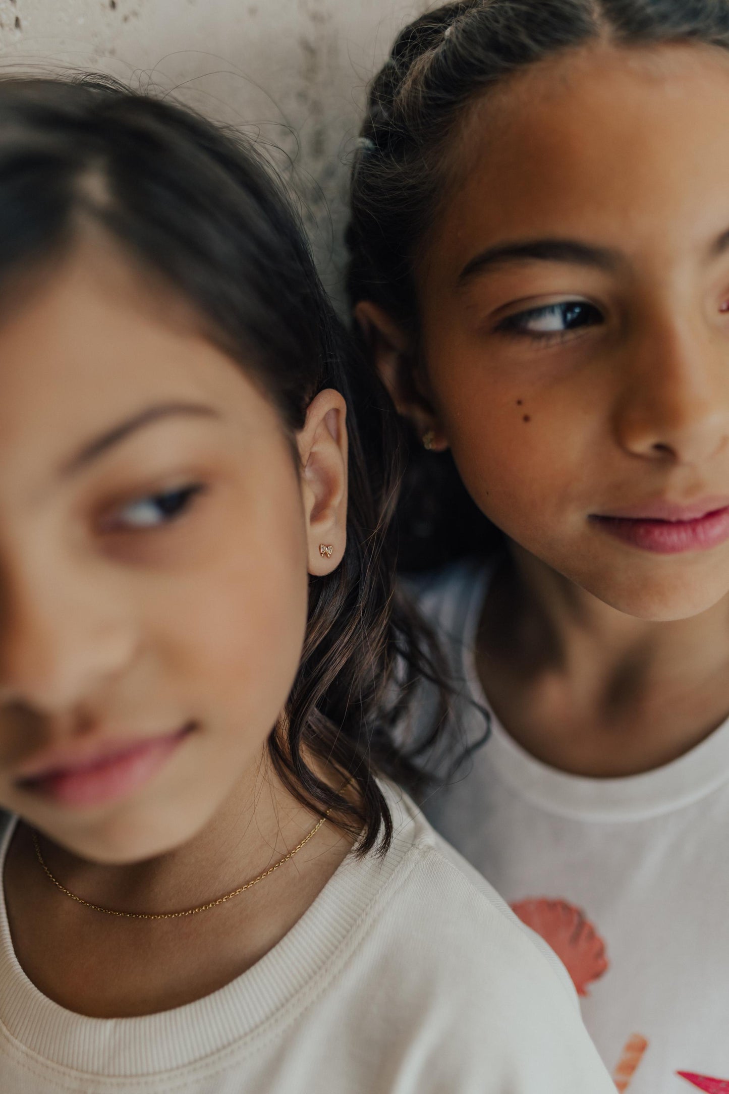 Brinco Mini Laço Cravejado Dourado