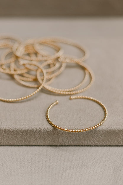Bracelete Torcido Slim Dourado