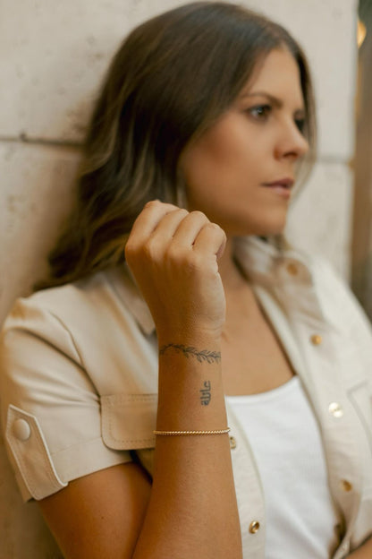 Bracelete Torcido Slim Dourado