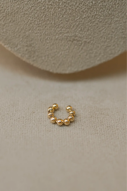 Piercing Fake Bolas Dourado