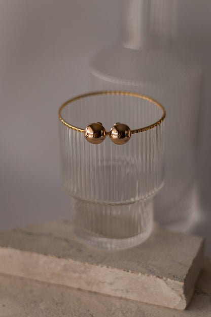Brinco Botão Meia Esfera P Dourado