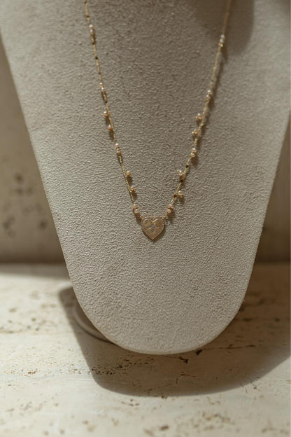 Colar Longo Pérolas Água Doce Coração e Crucifixo Dourado