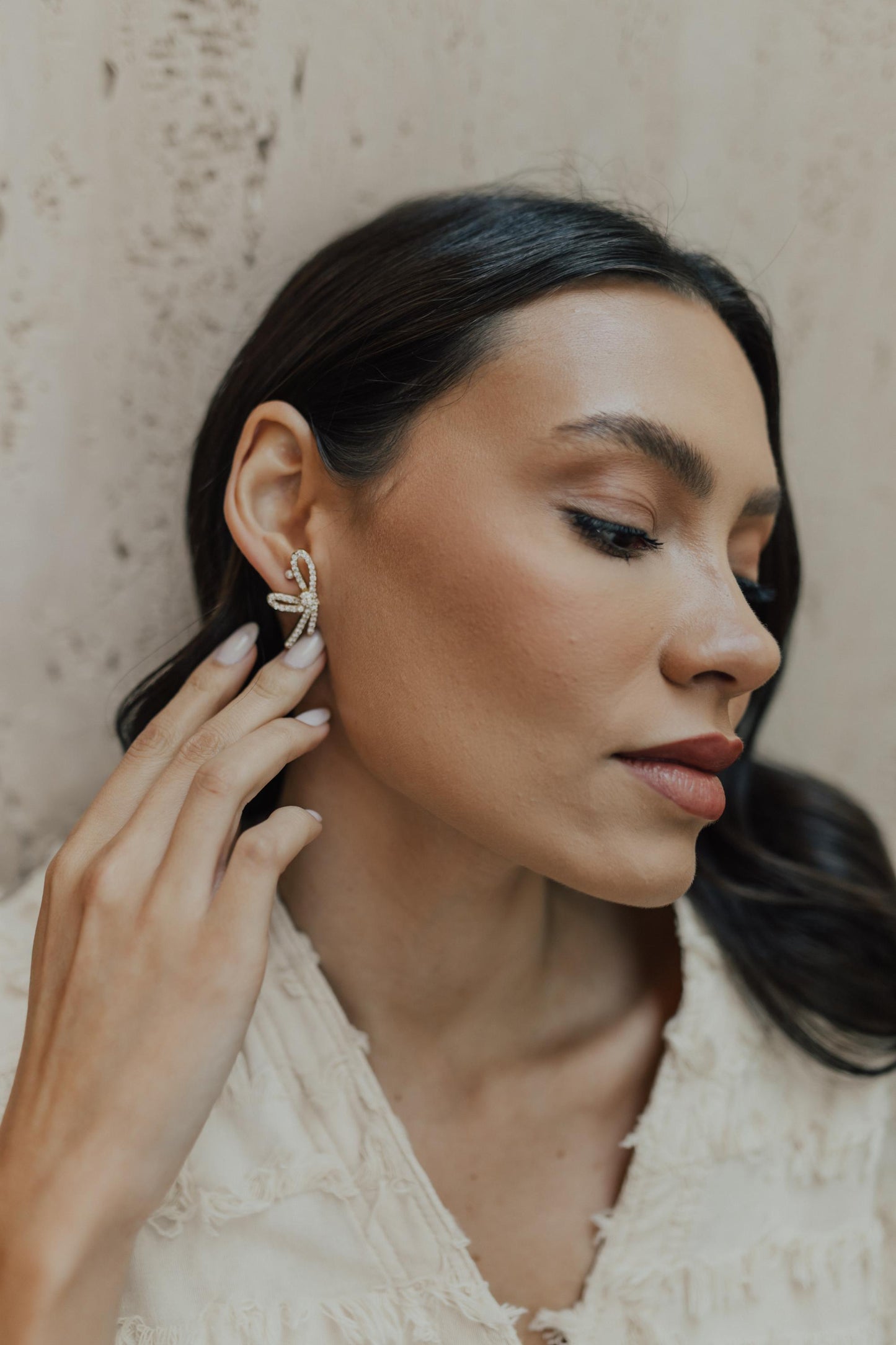 Brinco Laço Cravejado Dourado