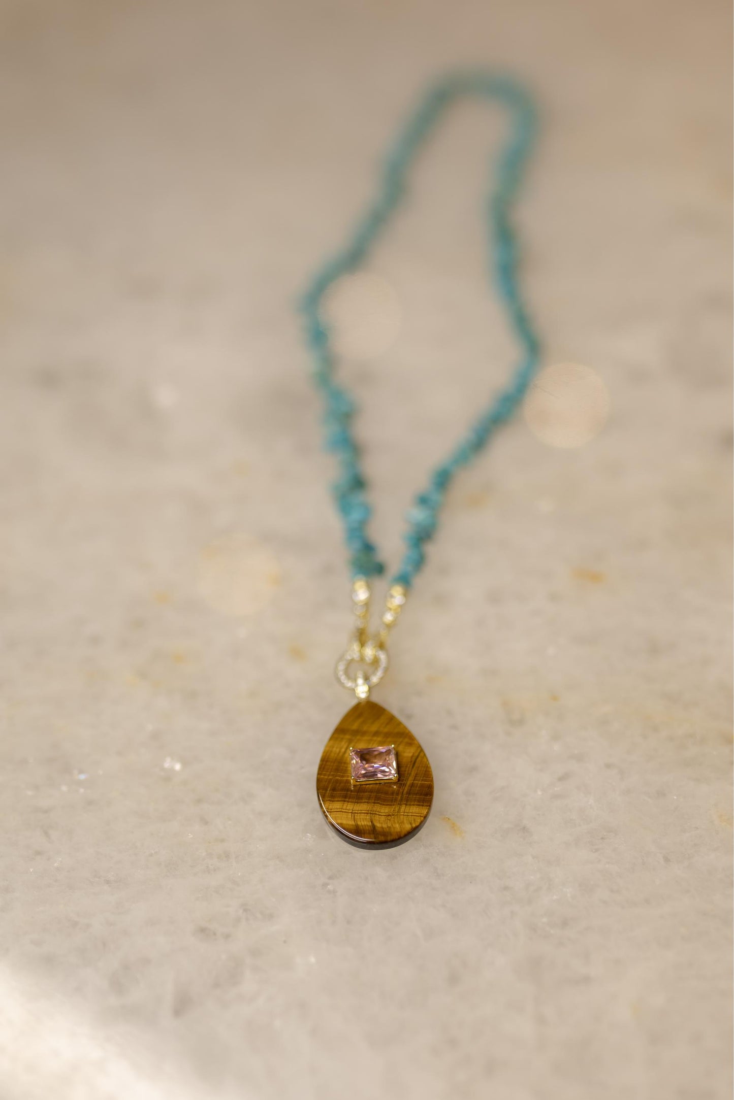 Colar Raolita Turquesa Olho de Tigre Dourado